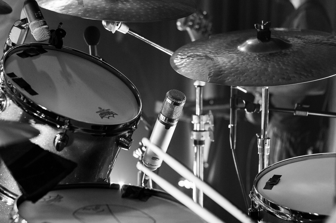 Grayscale Photo of Drum Set